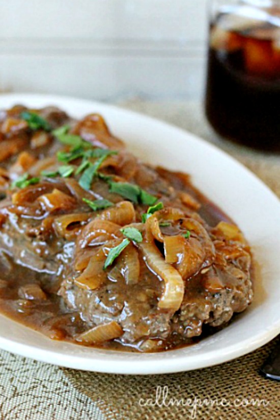 Hamburger Steak with Onions and Brown Gravy on a platter