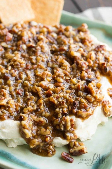 French Quarter Pecan Cheese Spread Recipe Seasoned cream cheese is topped with pecans in a brown sugar and mustard glaze.