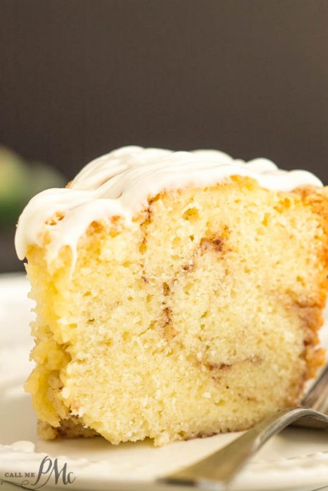 plated slice of moist cinnamon roll cake.