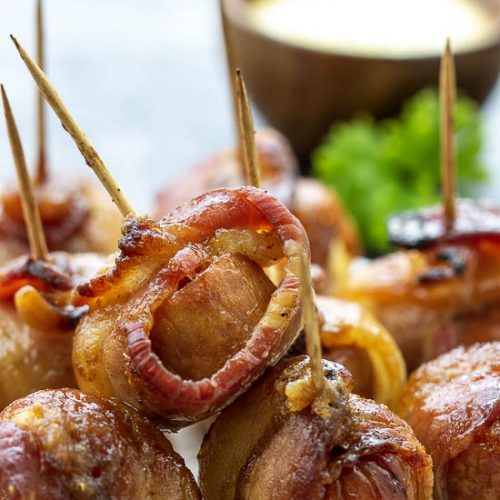 Bacon wrapped store sausage