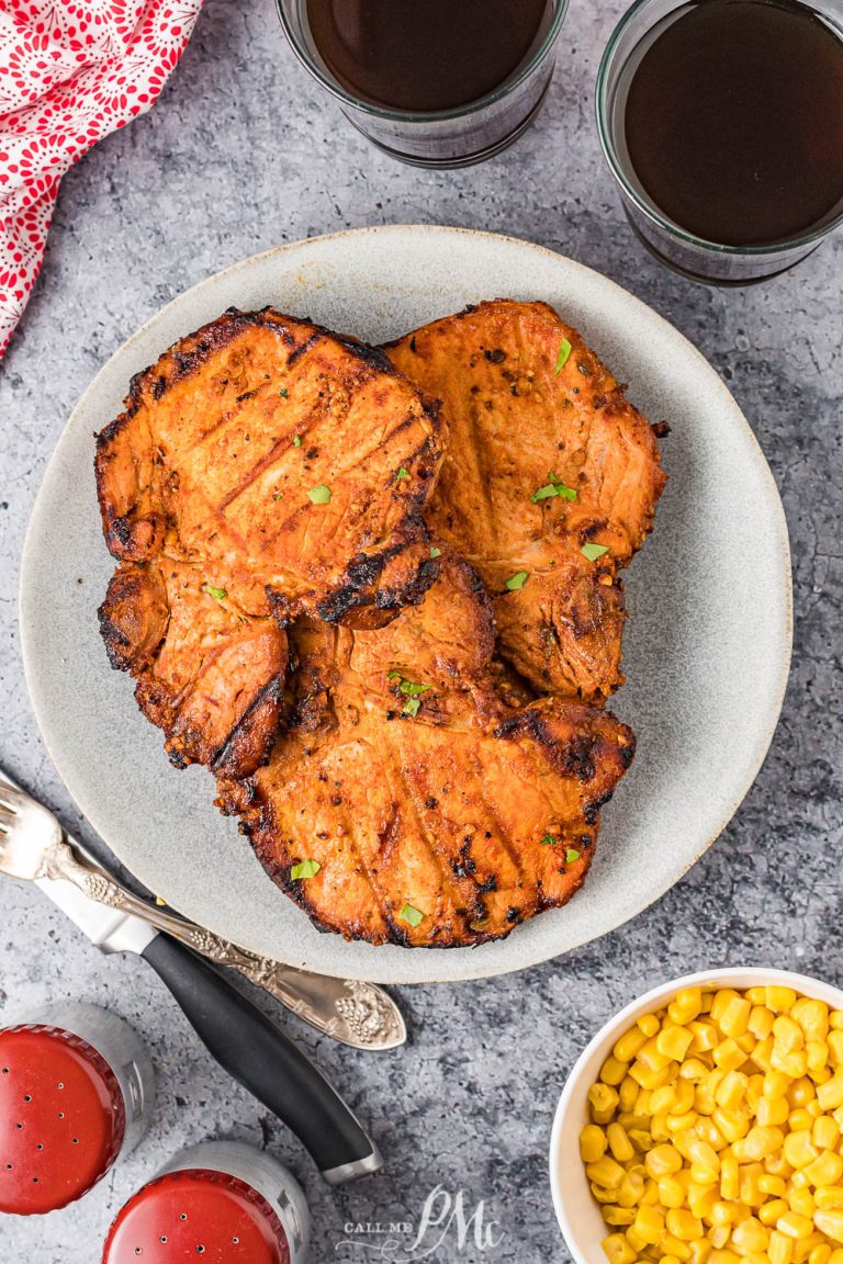 Juicy Ultimate Grilled Pork Chops recipe seasoning & marinade with tips for the best grilled bone-in pork chops & sides to serve with.