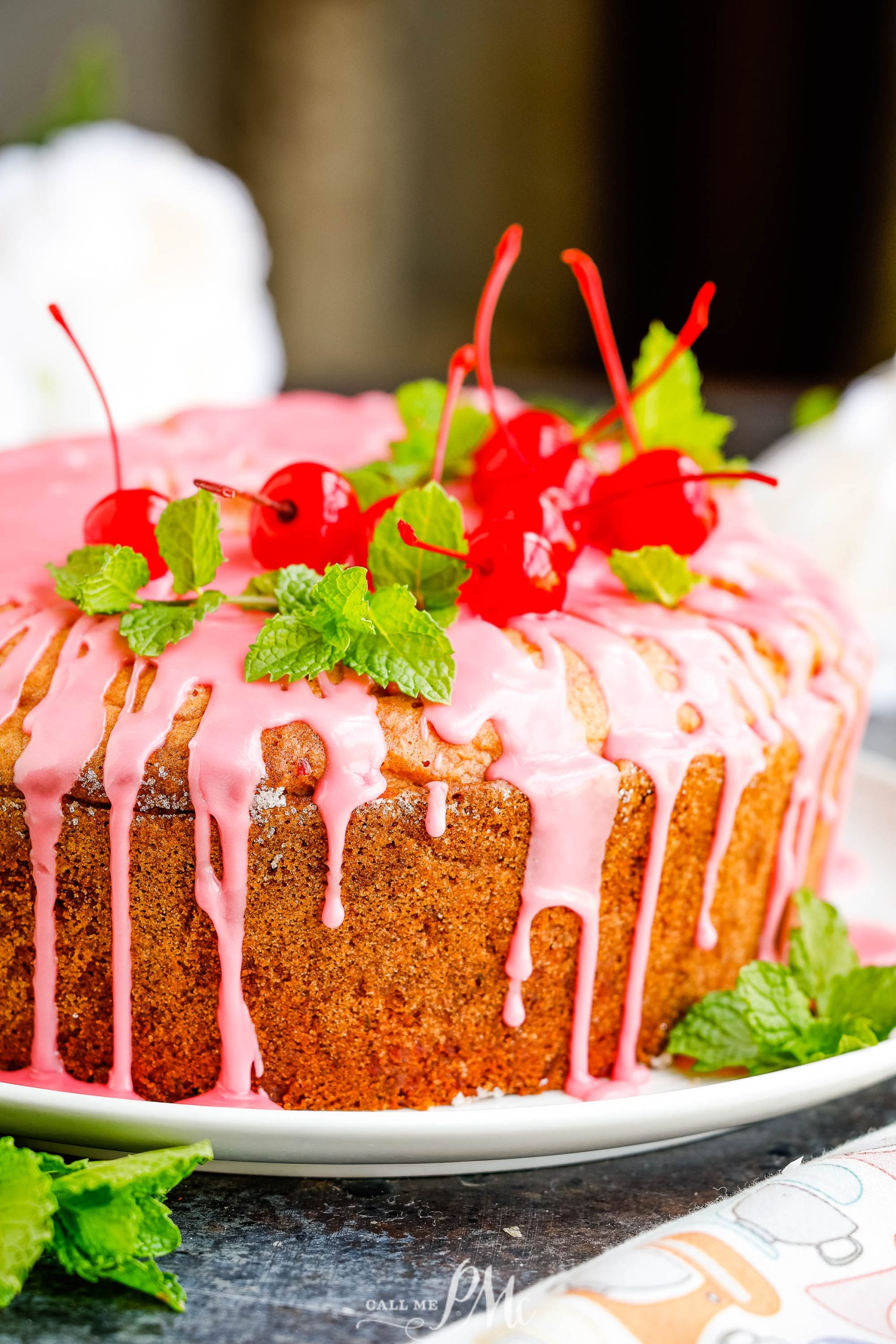 Cherry pound cake on a platter.