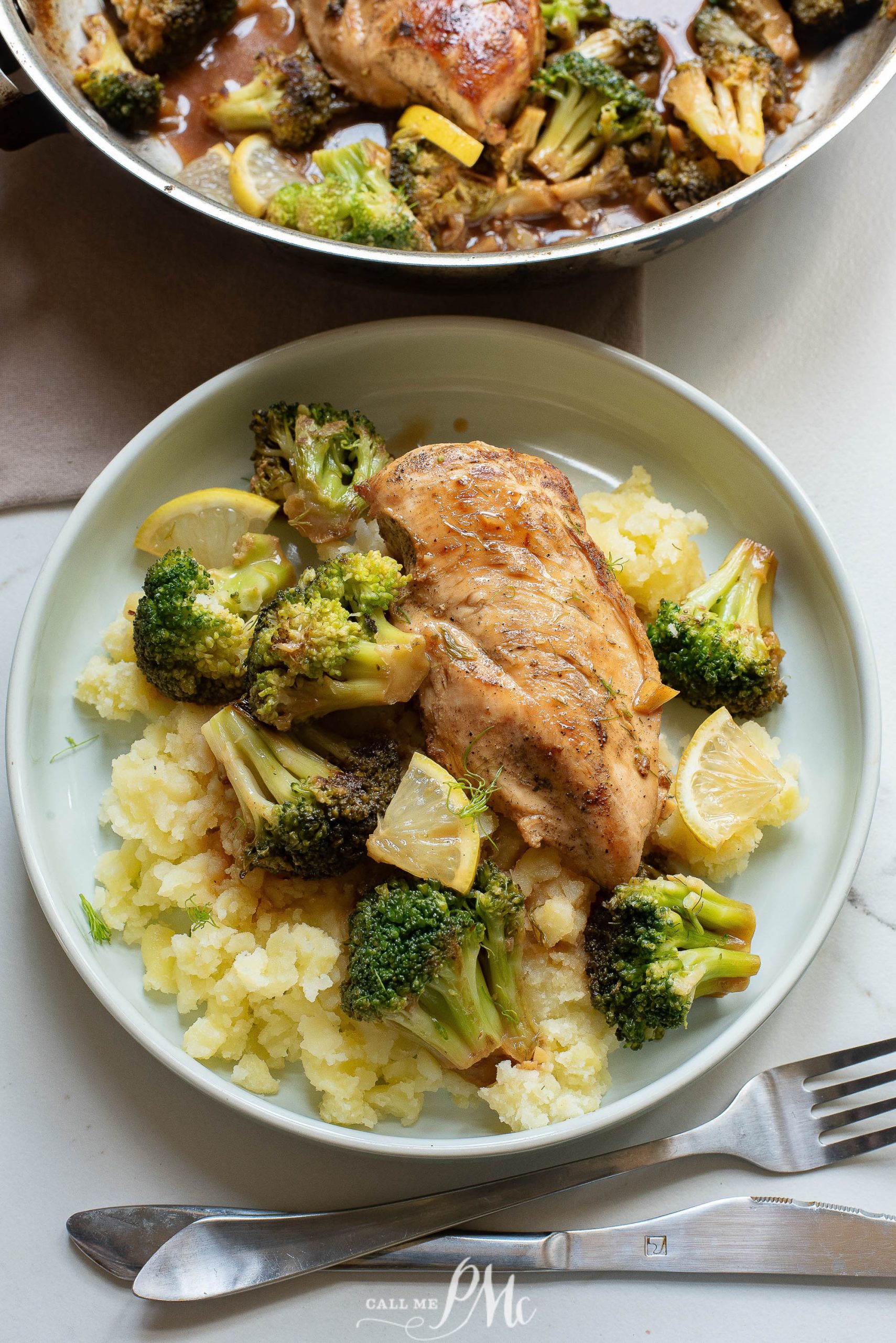 Grilled chicken breast with broccoli and mashed potatoes on a plate.