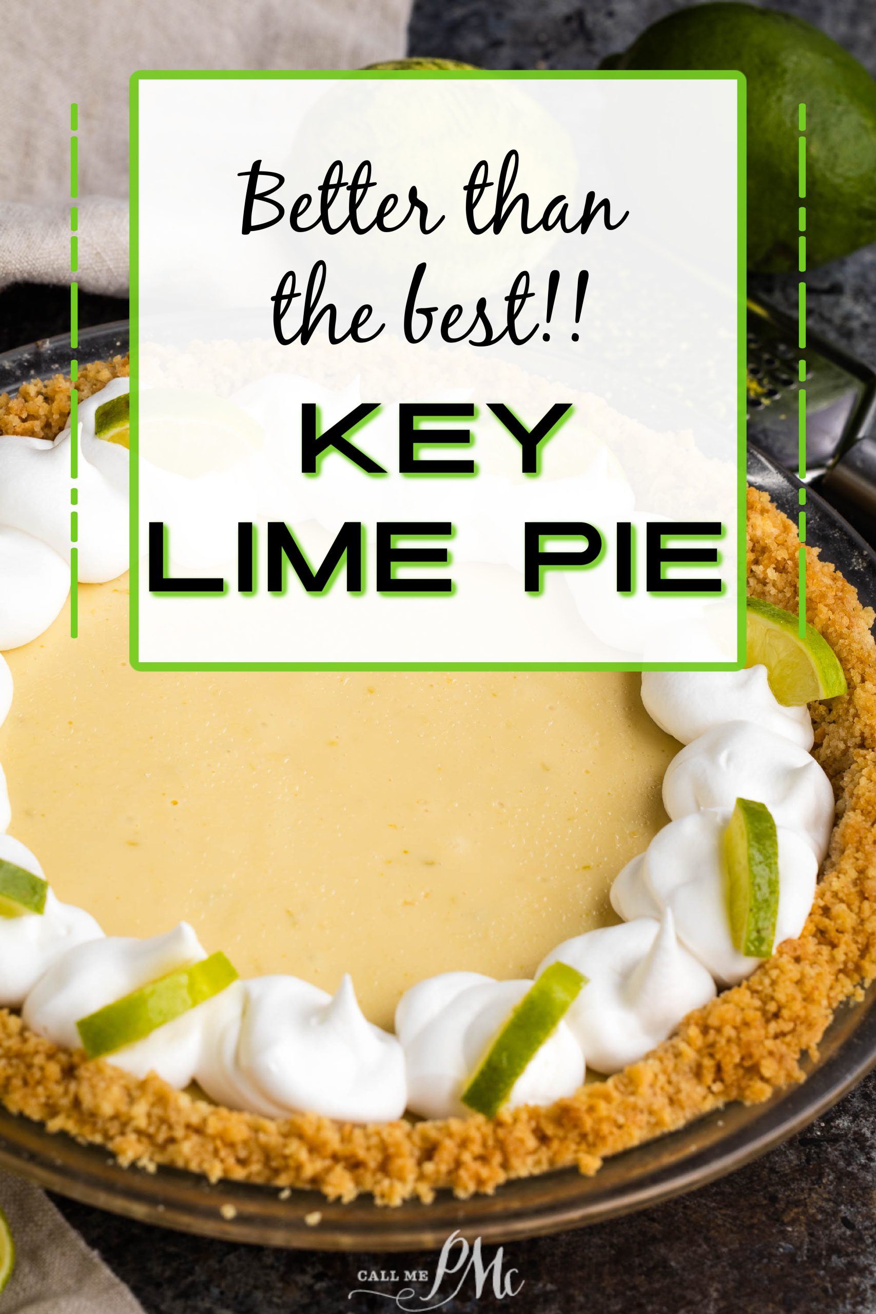 A key lime pie with a graham cracker crust, topped with dollops of whipped cream and lime slices. A sign above reads "Better than the best!! KEY LIME PIE".