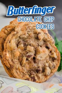 Close-up of two chocolate chip cookies with a "Butterfinger Chocolate Chip Cookies" label at the top.