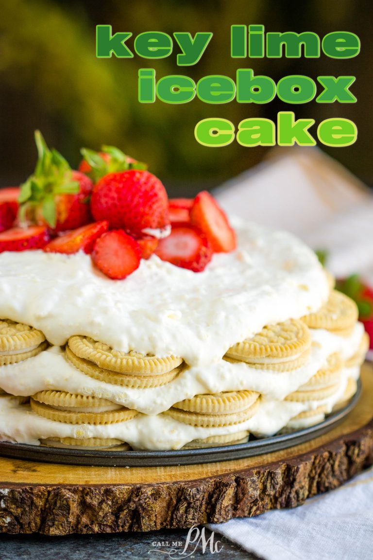 A key lime icebox cake on a wooden serving board, topped with cream and sliced strawberries. Large, colorful letters above the delicious dessert spell out "key lime icebox cake.