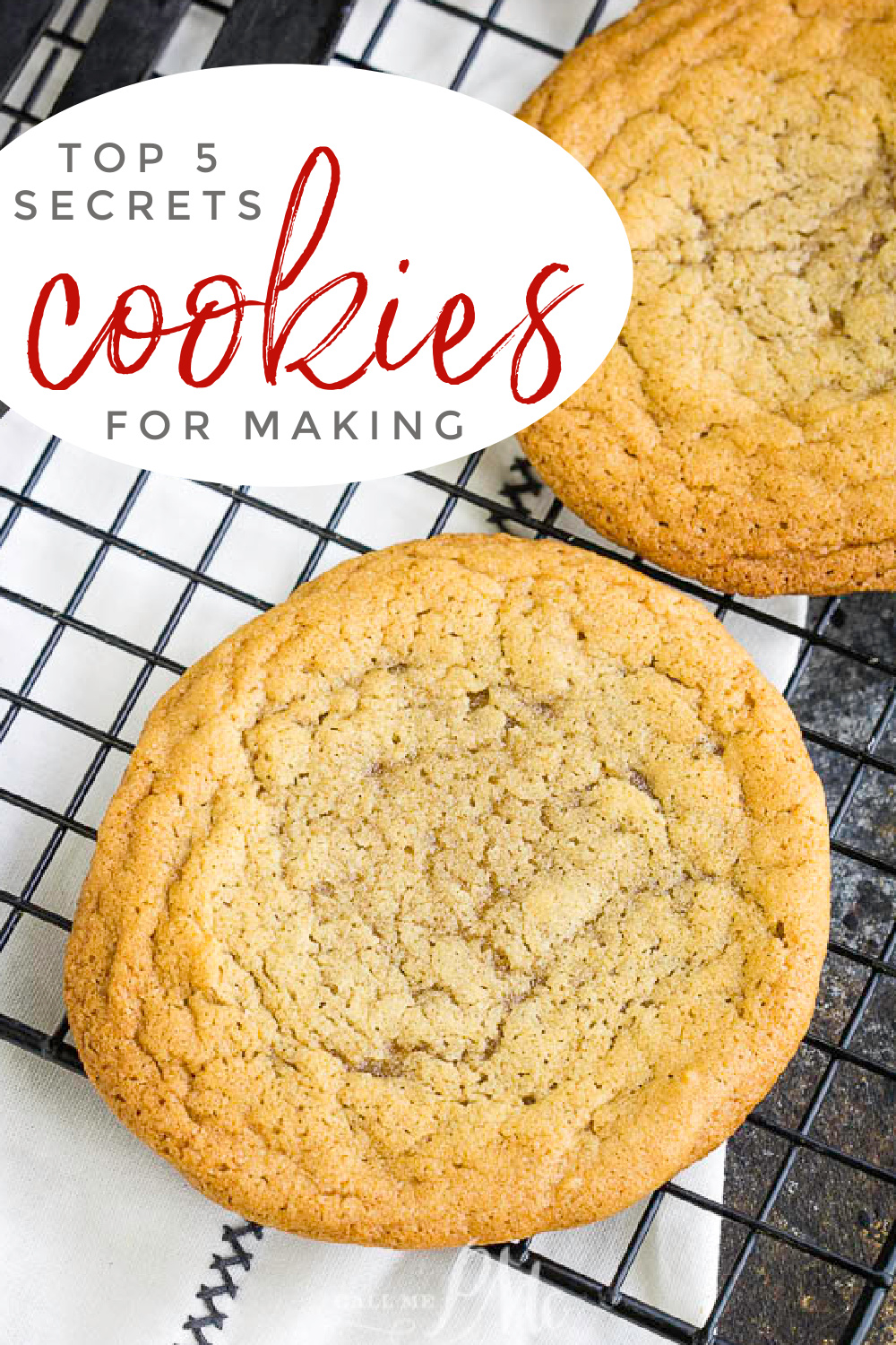 Two large cookies on a cooling rack with a text overlay reading "5 Secrets to Baking the Best Cookies.