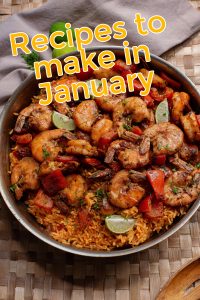 A skillet dish featuring seasoned shrimp, rice, and lime wedges shines as a perfect recipe to make in January.