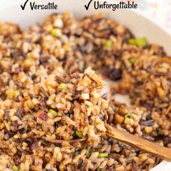 Bowl of wild rice pilaf with a wooden spoon. Text highlights its ease, versatility, deliciousness, and unforgettable taste.